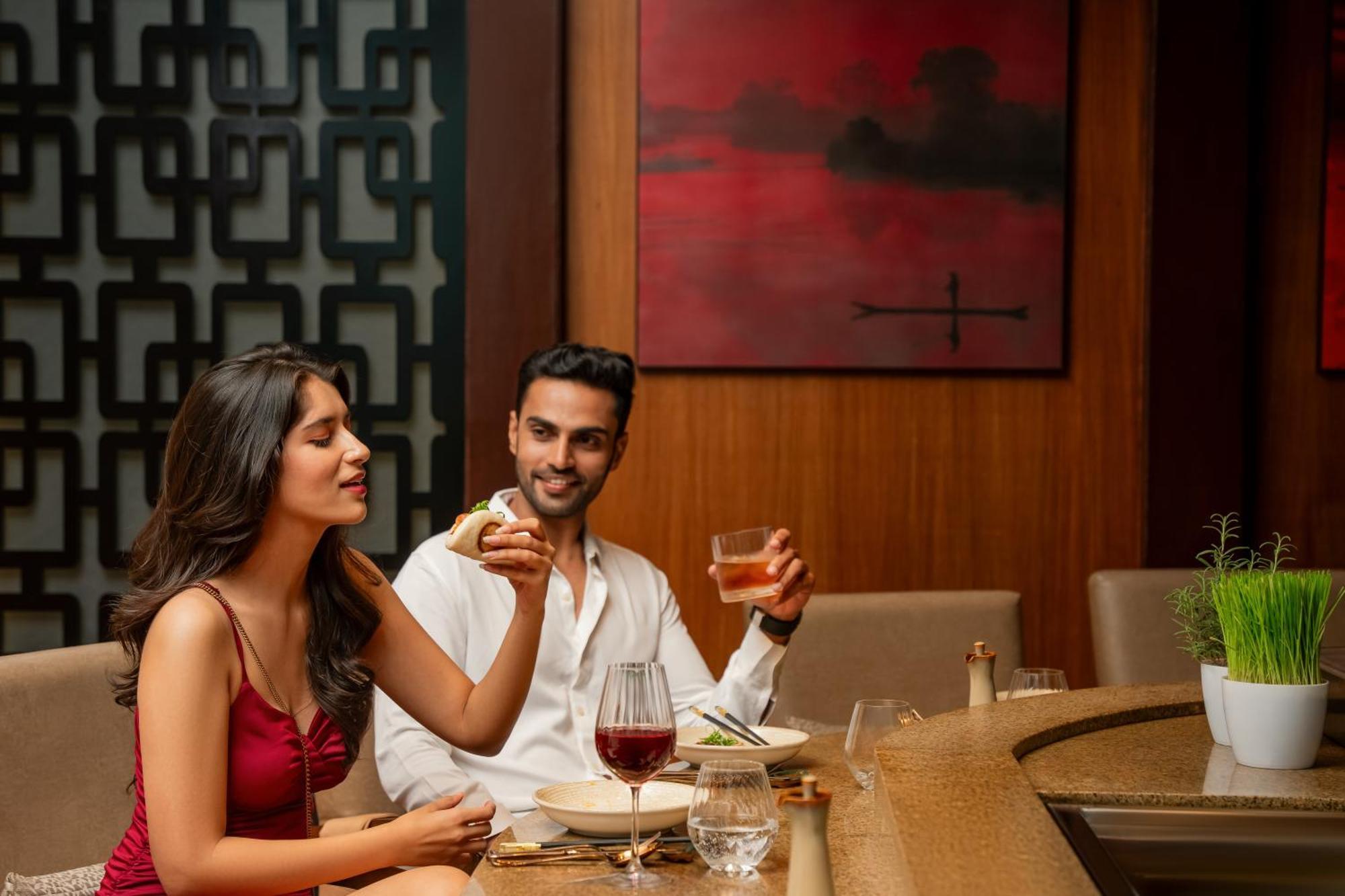 Hyatt Pune Dış mekan fotoğraf A couple dining at a restaurant